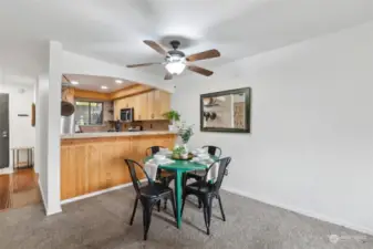 Dining area features ceiling fan.