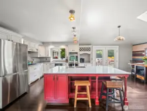 Chef's kitchen with shaker cabinets and stainless appliances!