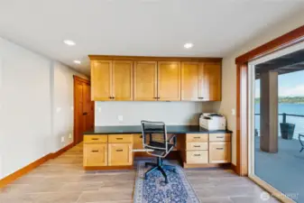 Built-in desk space on lower level is perfect for home office space. Enjoy views of the waterfront while you work.
