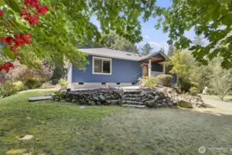 True front door to main home.