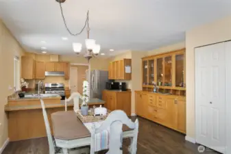 Main home dining room looking into large kitchen with newer appliances!