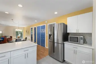 2nd home kitchen looking into dining/living...2nd bedroom door left of fridge.