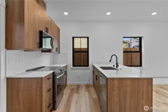 Walnut cabinets & island in kitchen