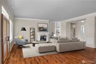 Large Great Room with engineered hardwood floors and gas fireplace.