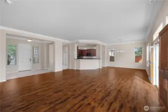 Large Great Room with engineered hardwood floors and gas fireplace.