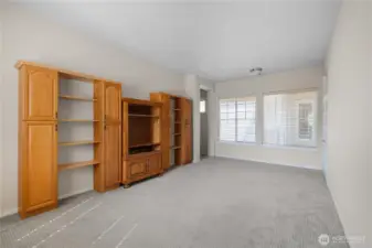 Bright and light bonus room that leads to 2nd bedroom, flex room, and full bathroom.