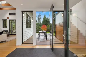 The entryway sets the tone with a nice flow to the garden deck. The living room, dining room and kitchen are to the left. The bedroom wing is to the right.