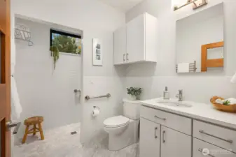The main floor 3/4 tile bathroom with heated floor.
