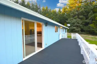 Lovely deck to relax aand enjoy your peaceful, private back yard.