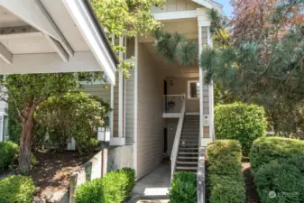 Top floor, end-unit conveniently tucked away directly behind your carport