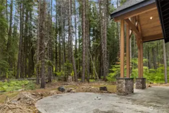 Future firepit with open space behind home