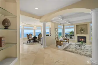 It’s a parlor or family room on the right with views and ambience around a fireplace