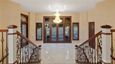 6-glass door entry with transom windows. So stunning!