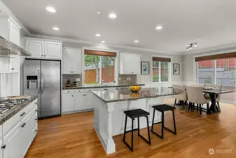 Kitchen: newly faced and fresh painted cabinet doors.