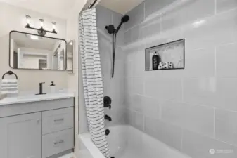 Full bath with tiled shower