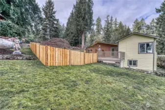 The deck area and a small portion of the yard is fully fenced.