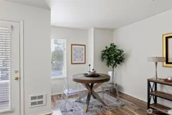 Dining nook with natural light flooding into this wonderful Ballard unit.