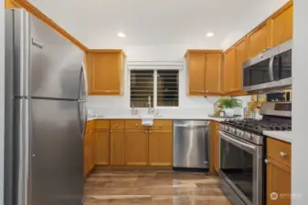 Kitchen with quartz countertops. New dishwasher installed 1/24/25.