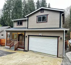 Covered Front Entry Way, Perimeter Lighting, Attached 1 Car Garage