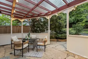 This second patio space is covered for year-round enjoyment.