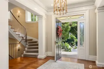 As you enter in the  front door, there is a big WOW factor, yet at the same time an understated elegance.  Notice the beautiful staircarse to the left...