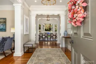 Looking into the home from the front door-straight ahead is the fomal dining room with French doors that open to the back garden.