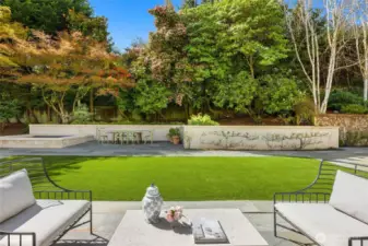 This is looking at the backyard from the French doors outside the dining room.  Notice how the mature landscaping gives you total privacy while you have great lilght as it is facing west.