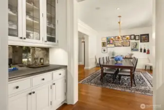 Back in the home, you walk through the bar from the dining room to the kitchen/famiy room.