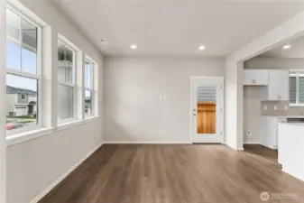 Enjoy quartz countertops, subway tile backsplash, and easy access to the walk-in pantry for added convenience.  Pictures are for representational purposes only, colors and features may vary.