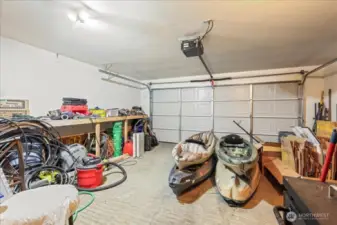 2 Car Garage With Electric Door Opener.