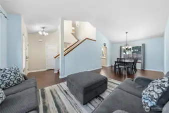 Large formal living connected to a formal dining room gives you all the extra entertaining space you're looking for.  Coat closet located right next to the front door.