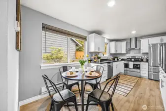 Dining area connected to the renovated kitchen.
