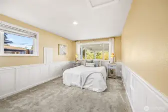 Oversized primary bedroom with connected full bathroom.
