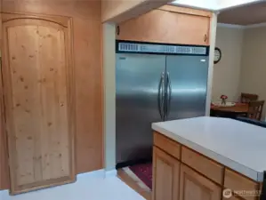 Full size stainless fridge and freezer, plus walk in pantry.