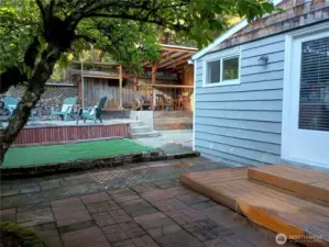 Fire pit and covered seating area.