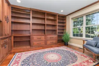 Large office with extensive cabinetry.