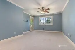 You can access the back deck from the Primary Bedroom.