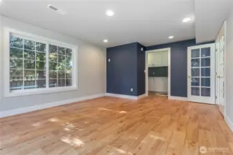 The exercise room is light and bright.