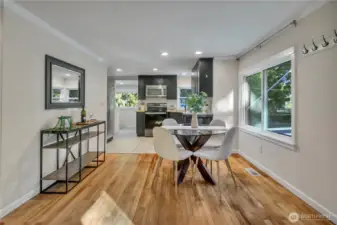 Open layout connects kitchen, dining, and living areas.