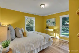 Bright and sunny upper level bedroom.