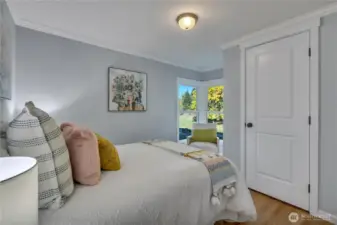 Upstairs bedroom featuring a cozy window nook.
