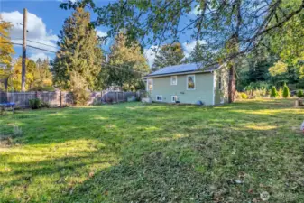 View from the southwest corner of the lot looking toward the home.