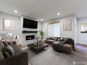 Gas fireplace.  Recessed lighting. Upgraded window blinds stay with home. Big screen TV included with sale.