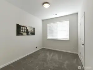 Front bedroom un staged. Extra Internet combo jacks.