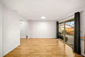 Dining area and new sliding glass door to private patio.