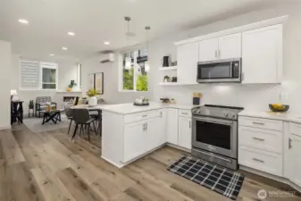 Note staging has been removed. Great room vibes with huge windows to let in the sunshine!