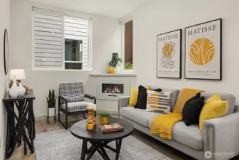 Large windows to let in the light plus cozy electric fireplace!