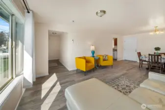 Large front window creates great natural light. New LVP flooring and fresh interior paint throughout.