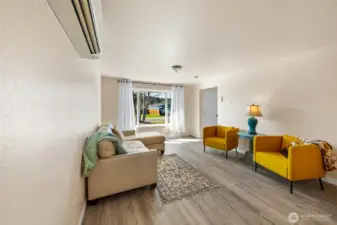 Mini split in living room offers heat and a/c.