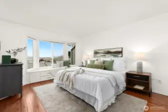 Primary bedroom with fantastic view and lovely window seat.